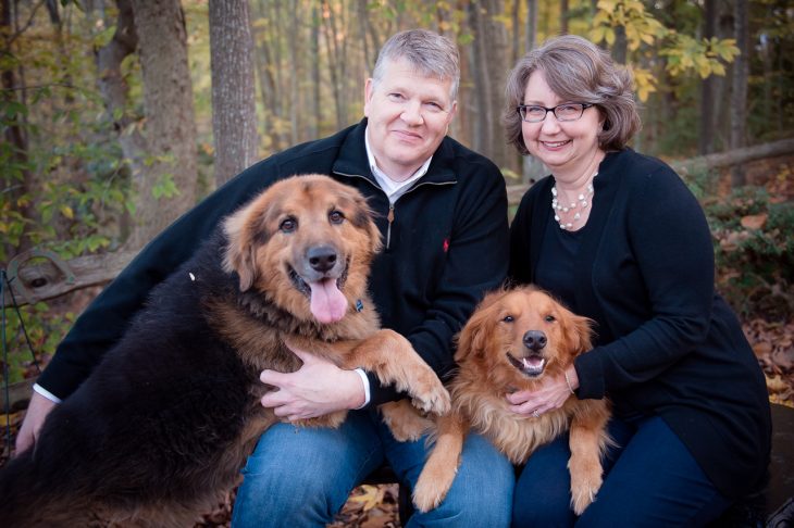 David Nelson, Founder & Owner of Caring Pet Cremation Services in King William, Virginia. Pictured with his wife, Michele and their two dogs.